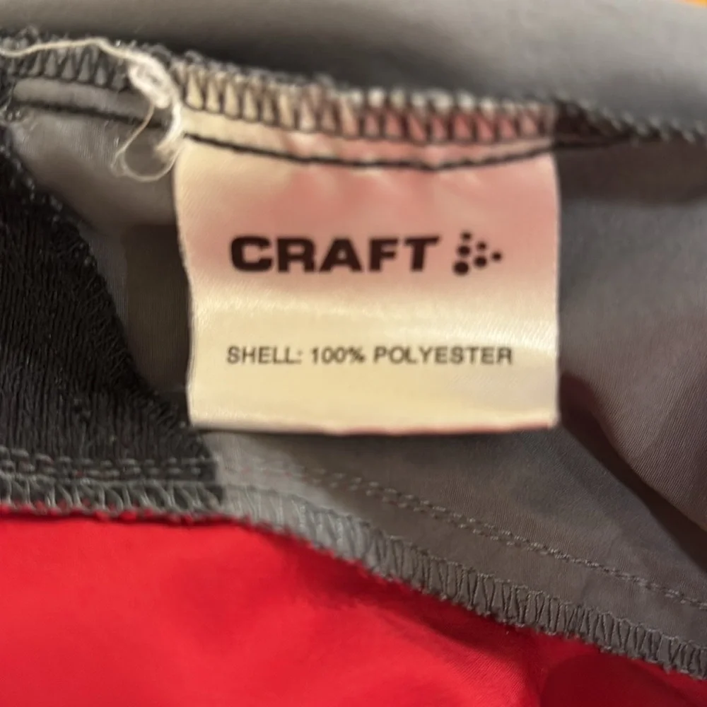 Craft Women’s Red and Gray Performance Windbreaker Jacket. Size M
